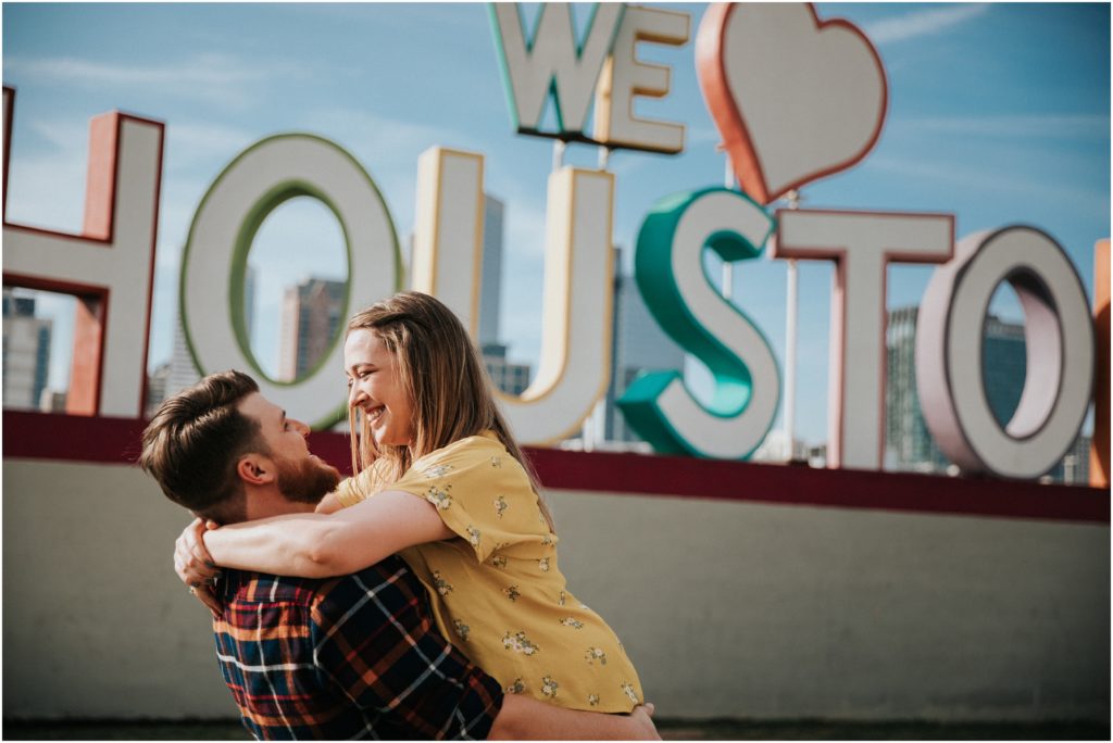 Engagement Photography at a brewery. 8th wonder brewery in Houston, Texas. We Love Houston Sign. Wedding Photography.
