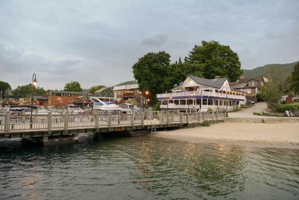 Lake george beach club dock and building.